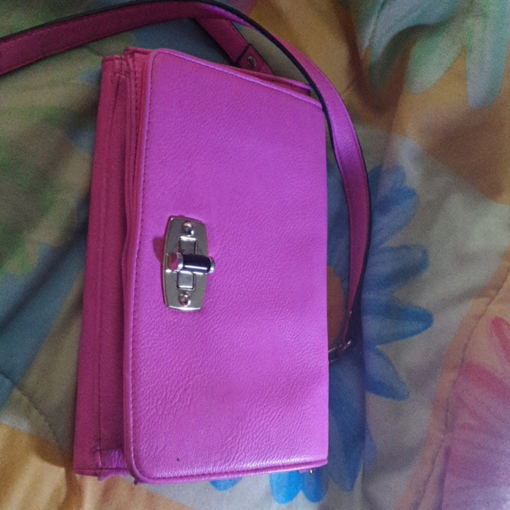A pink Merona cross body purse